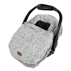 JJ Cole winter car seat cover with sherpa lining over baby in a stroller