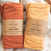 Joey + Joan cradle sheets 18x36 close-up reveals soft jersey fabric for gentle baby comfort.