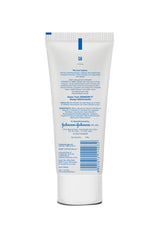 Johnson's Baby Cream application on a baby's cheek, smooth skin protection.
