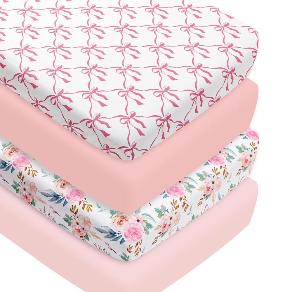 Jola's House bow crib sheets pack shows four colors for soft baby comfort.