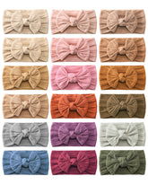 Jollybows 18pcs headbands set in assorted colors for easy outfit coordination.