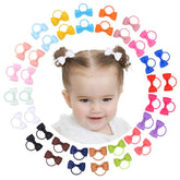 Jollybows 2in baby bows in multi colors provide gentle hold for delicate hair.