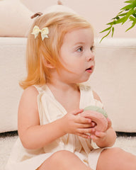 Jollybows 2-inch neutral bows offer versatile color options to pair with outfits.