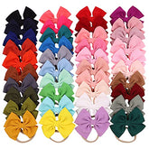 Jollybows 40pcs set packaging displaying vibrant bows for versatile outfit matching