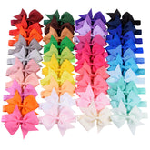 Jollybows 4-inch baby bows close-up, ideal for everyday outfits and gentle head comfort.