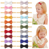 Jollybows baby bows headband nylon close-up showing soft stretch for gentle wear.