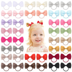 Jollybows baby hair ties with bows, 40-piece pack, gentle hold for fine hair.