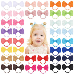 Jollybows baby hair ties with assorted color bows for versatile outfits.