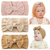 Jollybows baby headband ginger beige daisy front view keeps hair tidy for photos