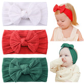 Jollybows baby headband red bow adds festive charm for Christmas outfits.