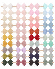 Jollybows color variety close-up on a nylon headband for outfit coordination.