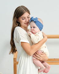 Jollybows handmade bow detail highlighting careful stitching for cute photos.