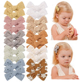 Jollybows mini 2-inch bow clip pack shows colorful tiny bows for everyday wear and easy styling.