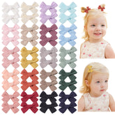 Jollybows mini lined hair clip close-up showing soft linen bow and gentle hold.