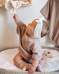 jollybows newborn headbands worn by infants with soft texture