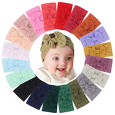 jollybows nylon headband closeup shows soft stretch for comfortable daily wear.