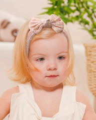 Jollybows nylon headwrap closeup shows stretchy, gentle fit for delicate baby skin