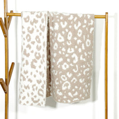 JOOJA soft baby cozy swaddling blanket in beige cheetah pattern offers gentle warmth for newborns.