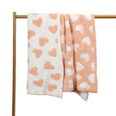 JOOJA ultra-soft baby blanket coral pink heart pattern ideal for newborn swaddling and cuddles.