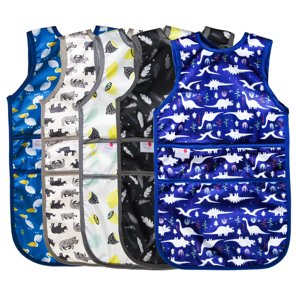 Joyo Roy mess-proof baby bib on a toddler during meals for less cleanup.