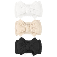 JOYOYO soft cotton double-bow headband white offers gentle comfort and keeps hair away from the face.