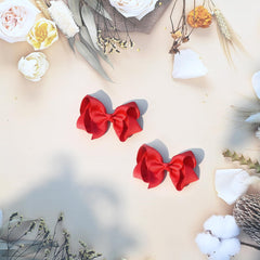 JUCCPUL red bow keeps hair away from face during play
