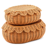 Juexica scalloped rattan basket with lid, front view, durable finish for nursery storage.