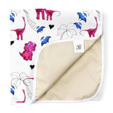 JumpOff Jo pink dinosaur splat mat under highchair for mess protection and easy cleanup.