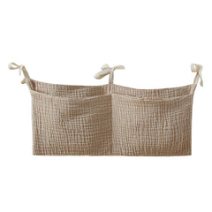 JUSTAUS bedside hanging bag strap for easy crib attachment and hands-free access.