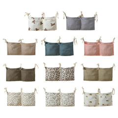 JUSTAUS bedside organizer open pocket showing diaper storage and bottle placement convenience.