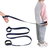 JXM Secure Wrist Leash worn by child for safe exploration in crowds and busy spaces.