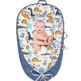 Kabirili baby lounger with reversible cover for quick style changes and comfort.