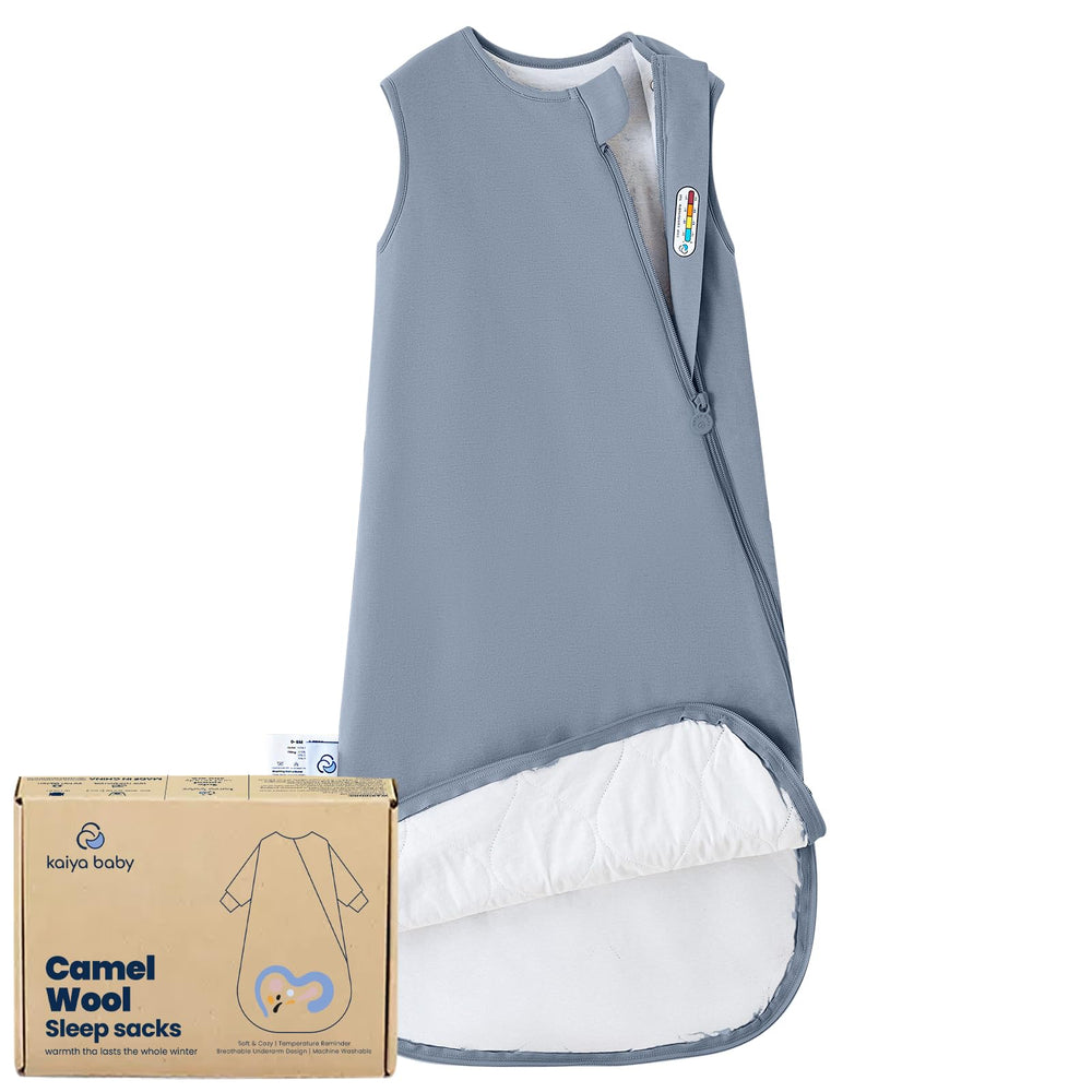 Kaiya Baby sleeping bag 0-6m flatlay, cozy wearable blanket for safe sleep.