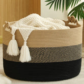 KAKAMAY large blanket basket folded for tidy living room organization.