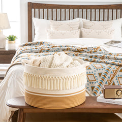 KAKAMAY large blanket basket in living room shows versatile laundry and blanket storage