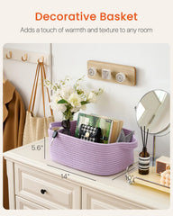 KALLAX small woven basket organizing towels and toys on a shelf.