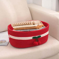 Kamuavni cherry-embellishment basket closeup showing handcrafted texture for cozy nursery decor.