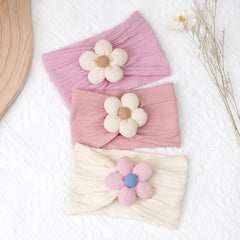 Kangaroo baby girls bows headband adds pastel flair for everyday outfits.