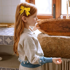 KCHIES handmade velvet bow detail emphasizes classic design and premium craftsmanship.
