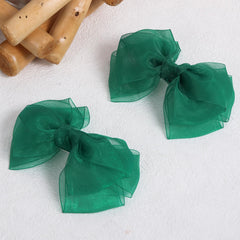 KCHIES Organza Double Bow Hair Clip highlights formal looks and stays secure.