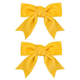 KCHIES velvet yellow bow 3-inch closeup highlights plush ribbon and secure clip for all day wear.