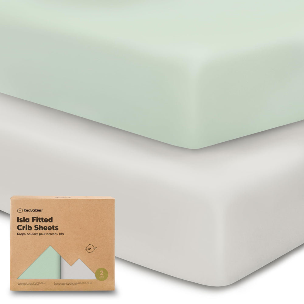 KeaBabies 2-pack crib sheets in Sage folded neatly on mattress for easy fit