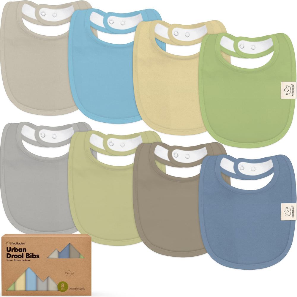 KeaBabies 8-pack organic baby bibs bundle shows versatile unisex styles for everyday feeding and teething.