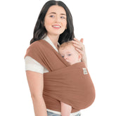KeaBabies Baby Wrap Carrier Terracotta front wearing shows ergonomic support for caregiver and baby.