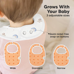 KeaBabies Cosmo full-coverage bib on baby; stays flat for mess-free use.