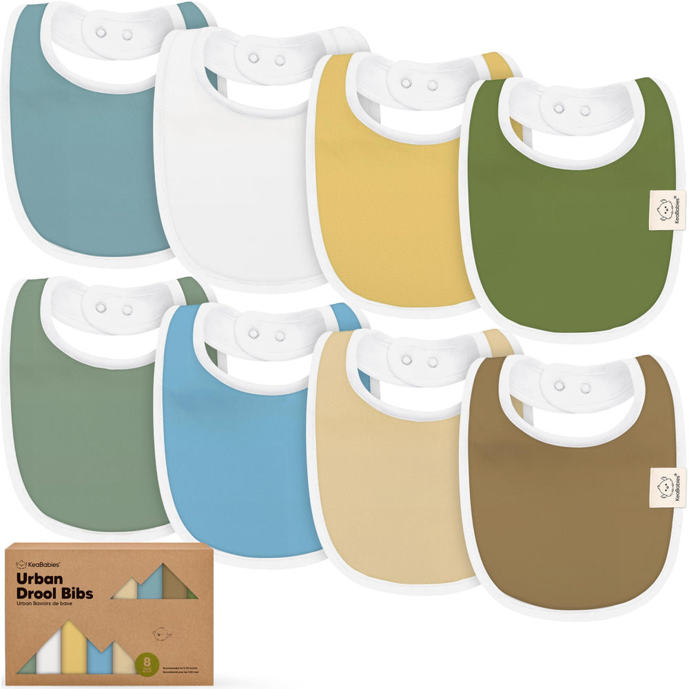 KeaBabies Daybreak 8-pack bibs laid out for easy drool management and outfit matching