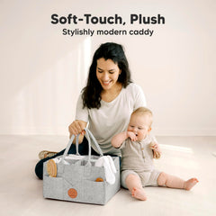 KeaBabies diaper caddy handle closeup highlighting easy grab-and-go portability.