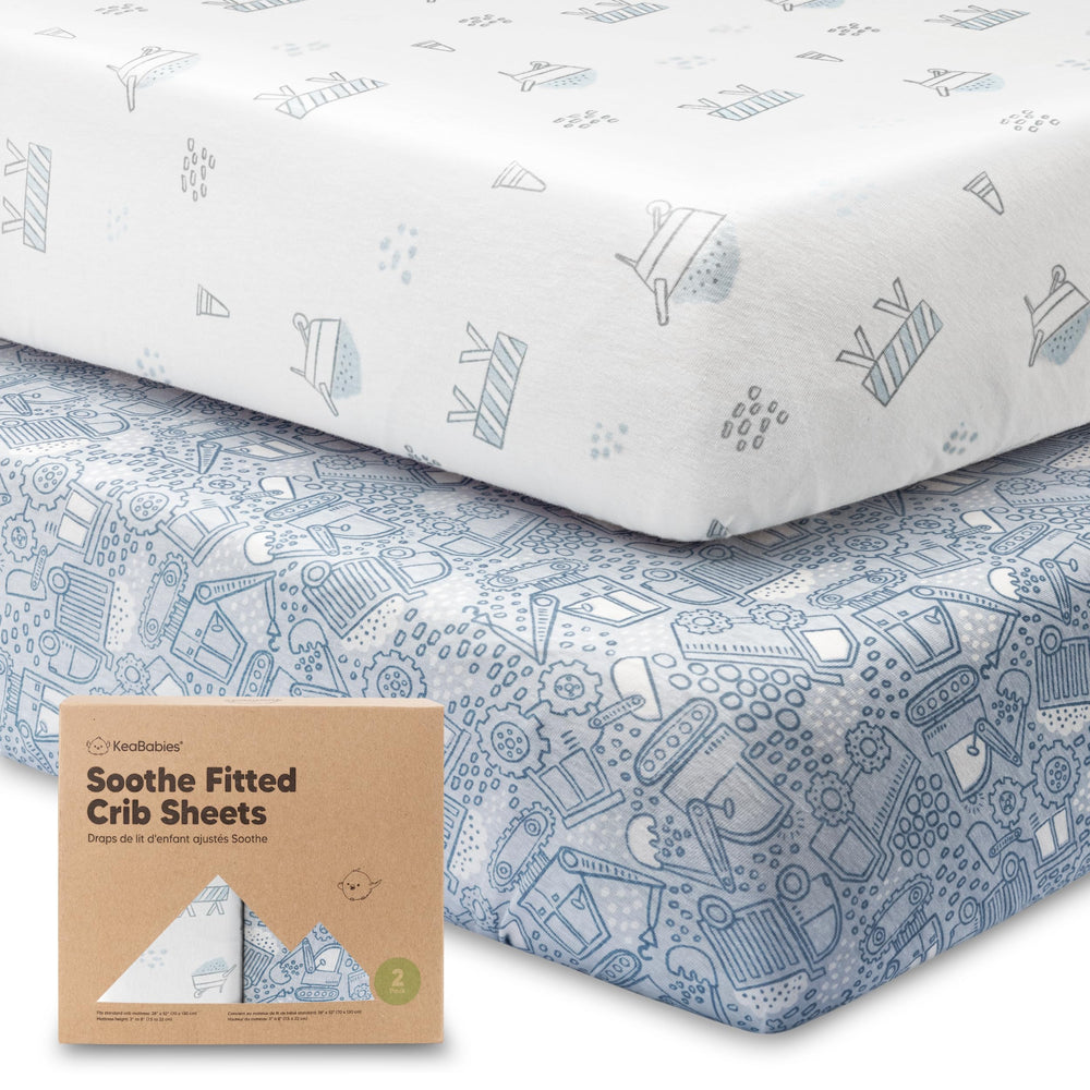 KeaBabies Excavation crib sheet 2-pack on a crib, soft organic cotton for baby comfort.