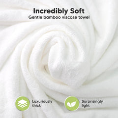 KeaBabies hooded towel baby-holding image highlights extra-large size for growing toddlers.