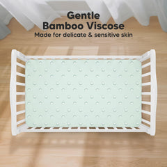 KeaBabies Isla fitted crib sheet with SnugFit Tech demonstrates easy fitting